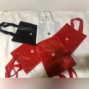 Five Lululemon reusable  shopping totes.